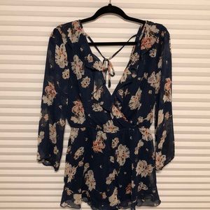 Double v back navy flower print romper
